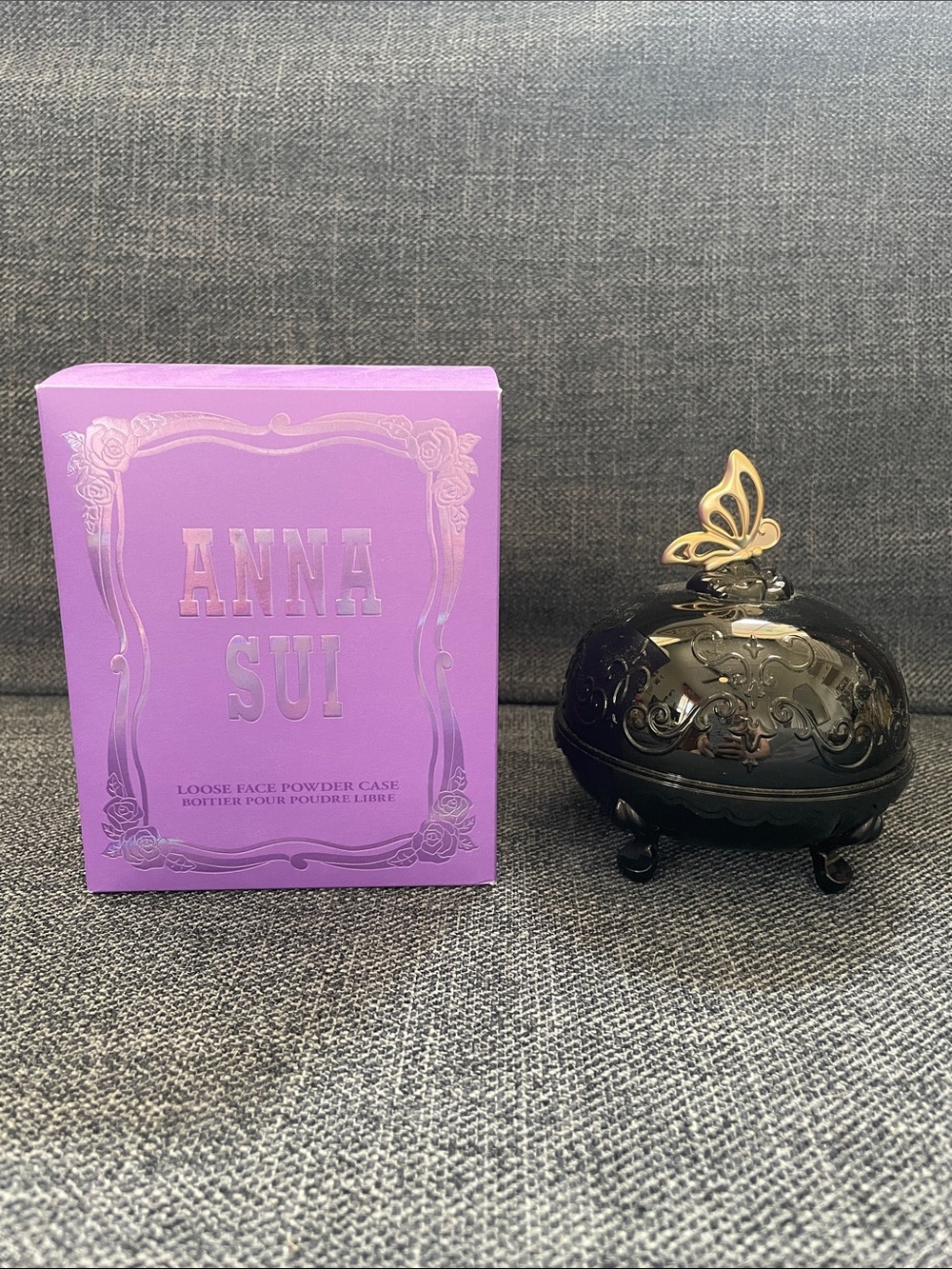 ANNA SUI Black Powder Case with Gold Butterfly Accent